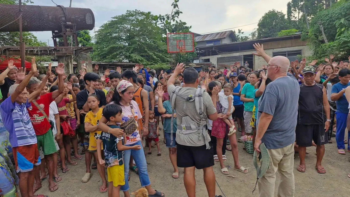 A Kingdom Legacy Ministries outreach gathering with families in a local community